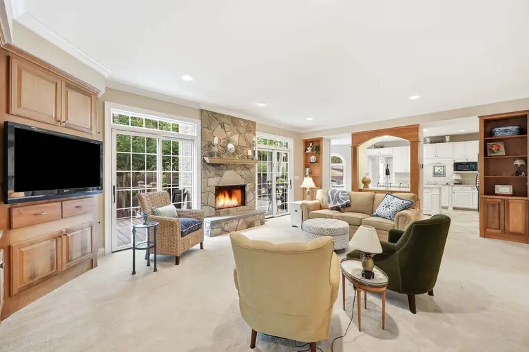 Interior real estate photography  -  living room with stone fireplace